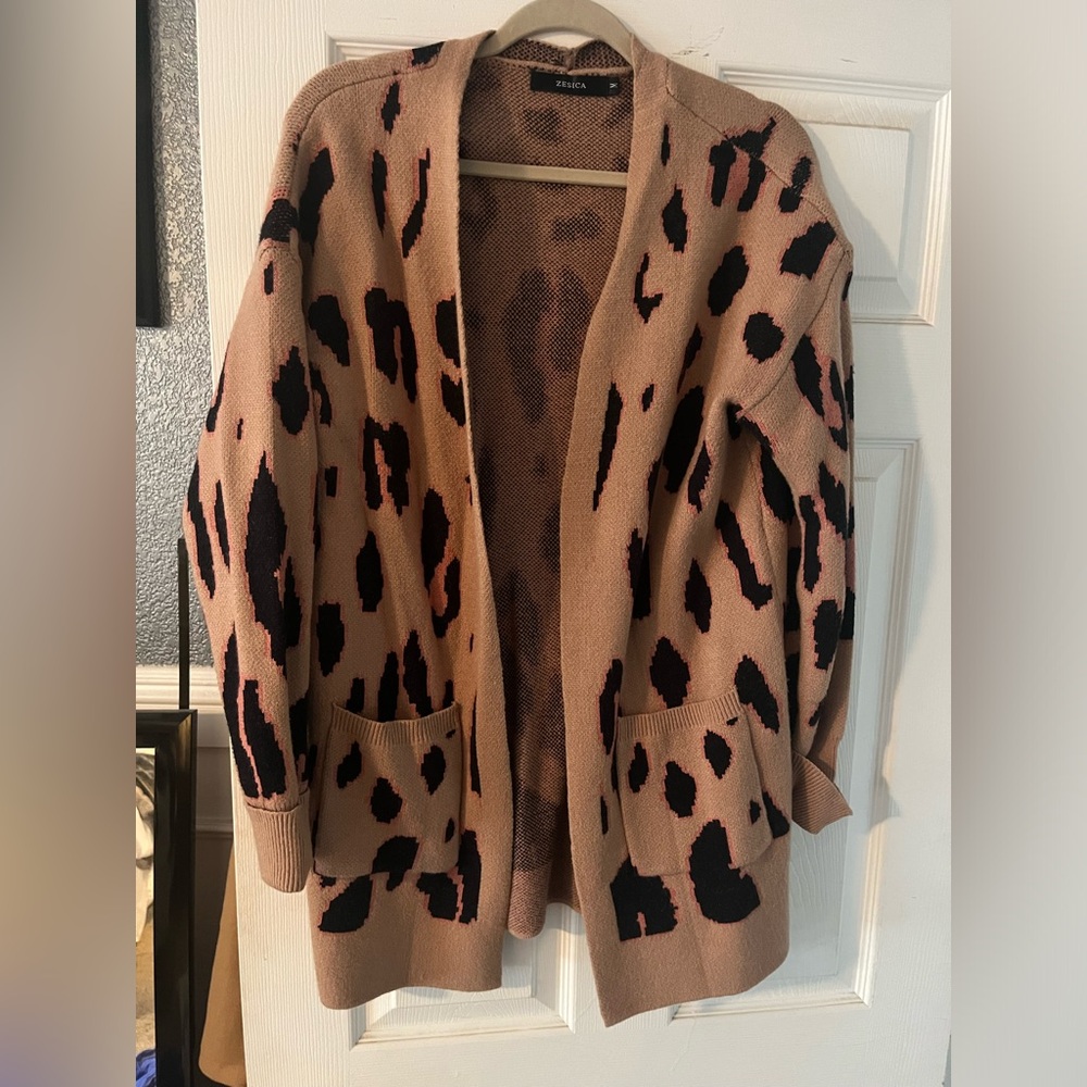 Leopard print cardigan. Tan with pink & black print. Size Medium. Very oversized
